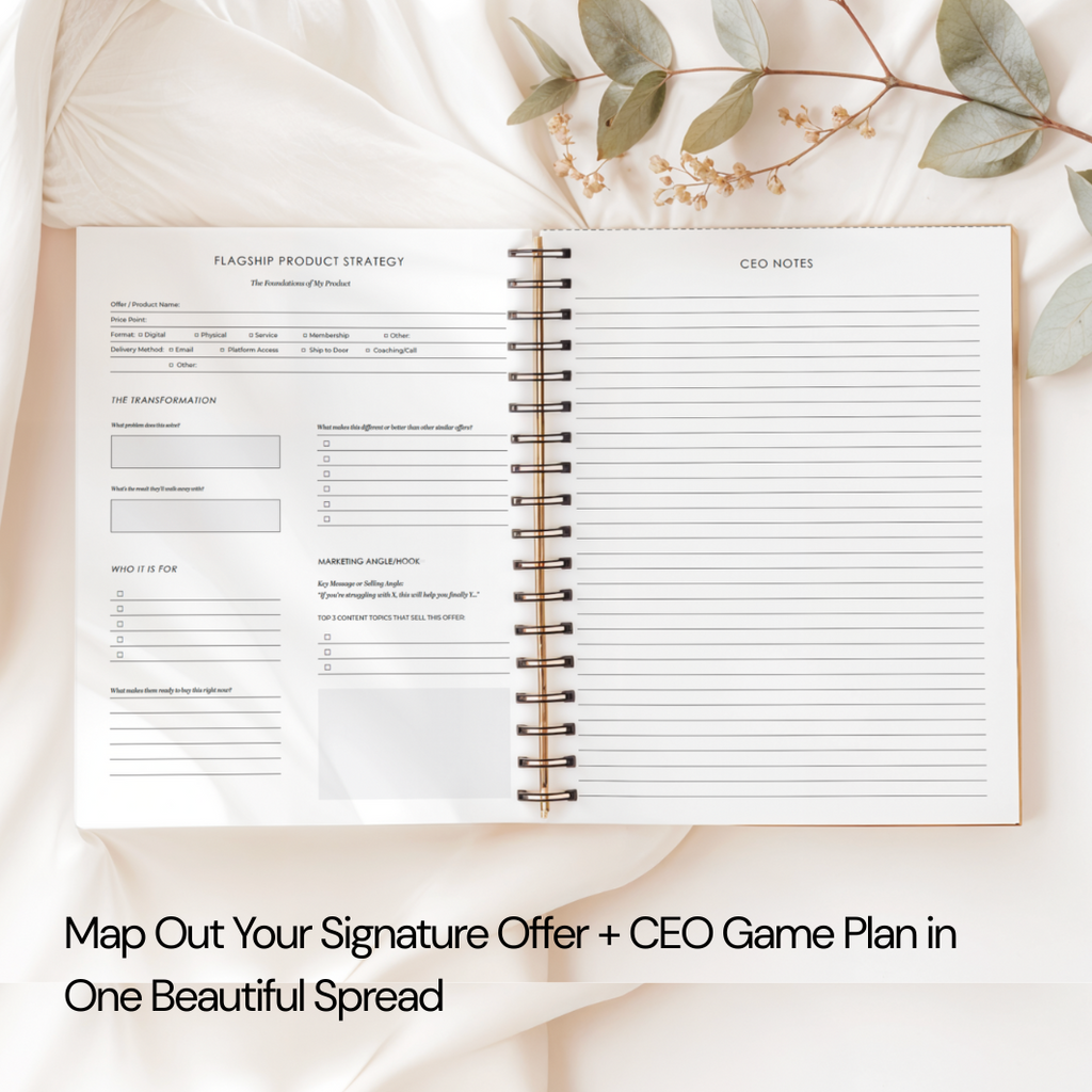 Open notebook with a CEO game plan on a soft beige background with eucalyptus leaves.