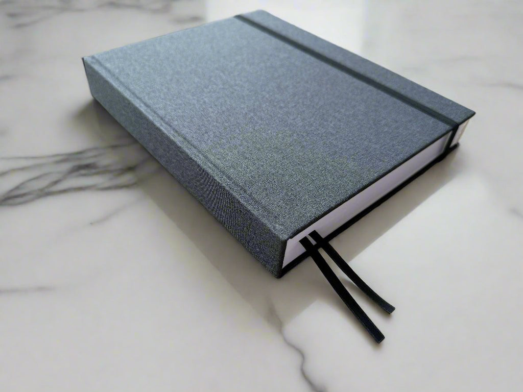 Minimalist men’s planner with hardcover design for daily organization and goal tracking